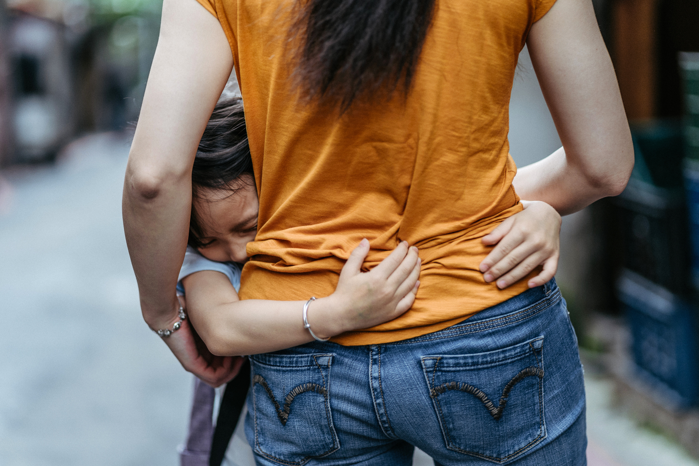 Child hugging mother